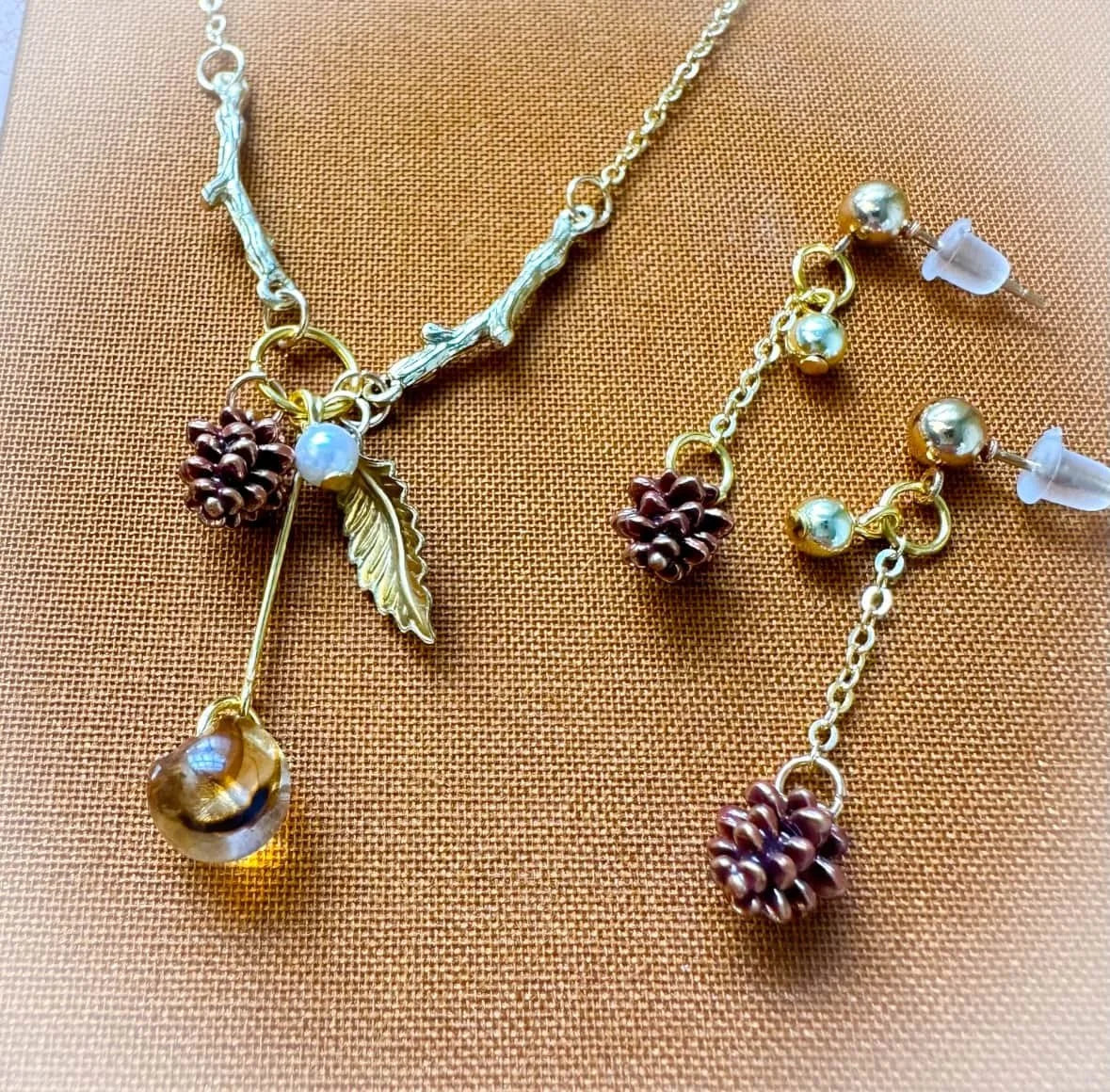 Autumn-inspired Jewelry. Think Tiny Pinecones and Charm Necklaces