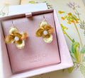 petals earrings in a pink box, carson