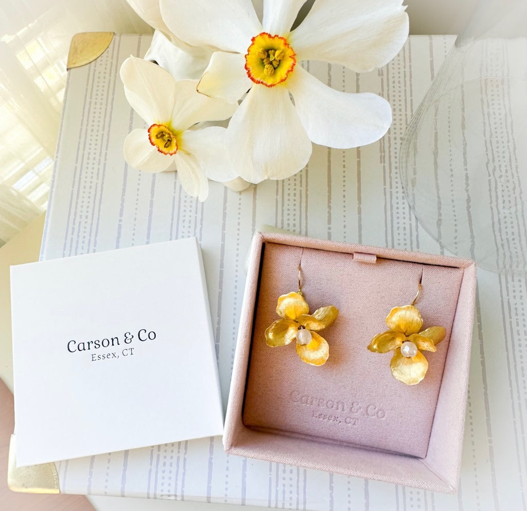 golden petals earrings in pink box