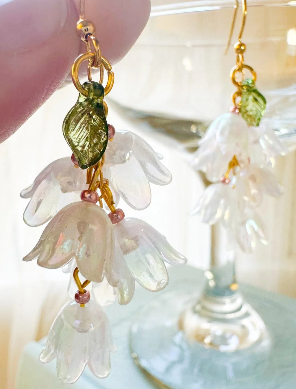 White Blossom Earrings With Green Leaf