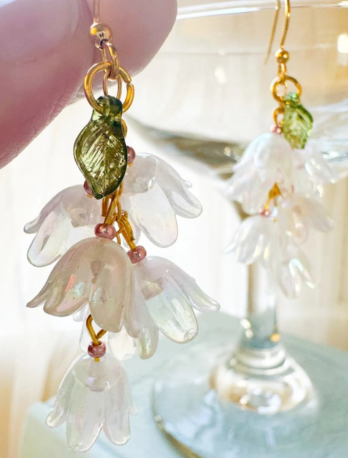 White Blossom Earrings With Green Leaf